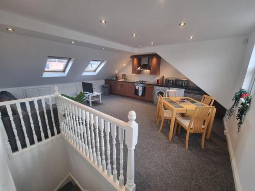 an overhead view of a kitchen and a dining room at The Loft in London