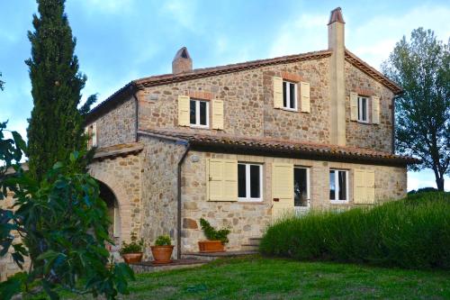 an external view of a stone house at Villa degli Artisti by Mmega in Canonica