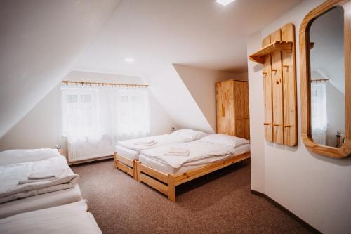 Tempat tidur dalam kamar di Ubytování u Foltýnů - Josefův Důl