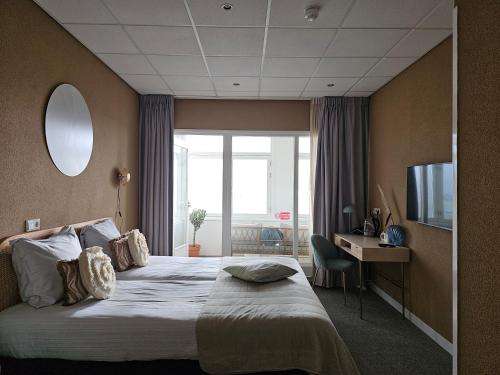 Postel nebo postele na pokoji v ubytování Hotel Restaurant Solskin