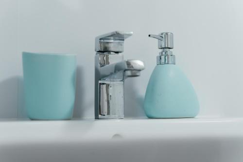 a bathroom sink with a faucet on a shelf at San Antonio mobile homes in Biograd na Moru