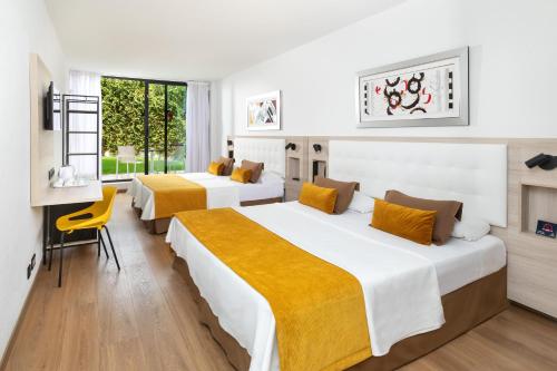 Letto o letti in una camera di Alexandre Gala
