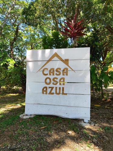 a sign that says casa osa at Casa Osa Azul in Puerto Jiménez