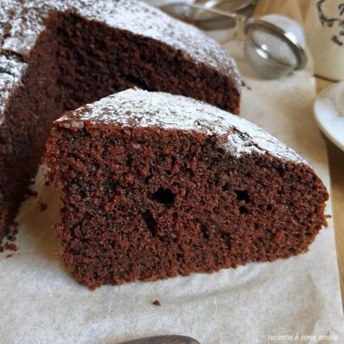 a piece of chocolate cake sitting on top of a table at Agriturismo I Grappoli in Alberese