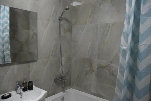 Et badeværelse på Real Resort- Apartament perfect pentru sejurul tau!