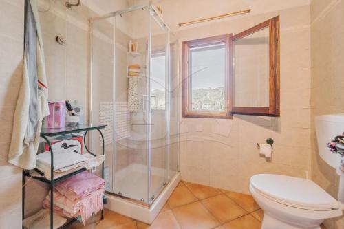 Et badeværelse på Villino Girasole - Goelba