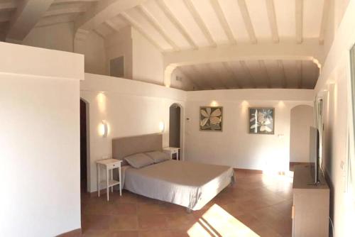 Кровать или кровати в номере Maison de 5 chambres a Rayol Canadel sur Mer a 250 m de la plage avec piscine privee et wifi