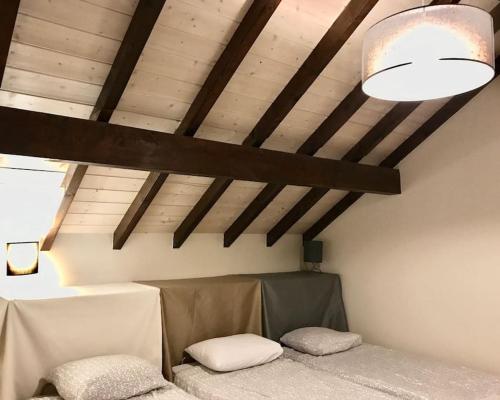 a room with a couch and a ceiling with a light at from Geneva,Big House,7 bedrooms in Archamps