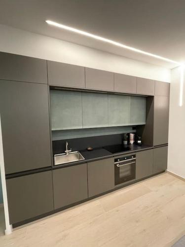 A kitchen or kitchenette at Minimal house - 4persone - centro