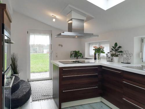a kitchen with a sink and a counter top at Holiday Home Sternenhimmel by Interhome in Schwanau