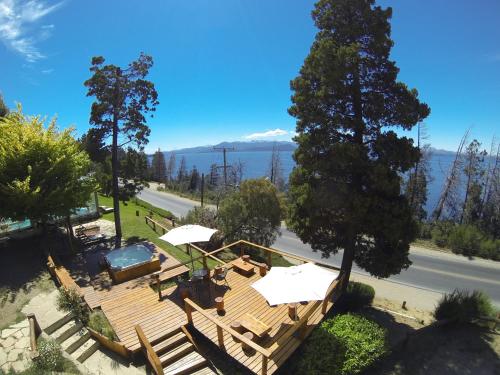 an aerial view of a deck with a view of the ocean at Pailahue Cabañas Lodge in San Carlos de Bariloche