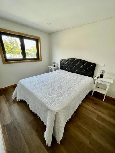 Postel nebo postele na pokoji v ubytování Casa das Varzielas