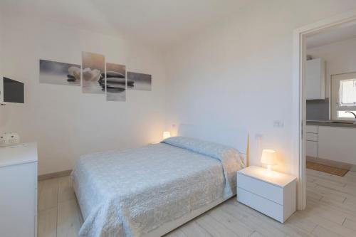 Ένα ή περισσότερα κρεβάτια σε δωμάτιο στο Casa Linda, il tuo rifugio nel cuore della città