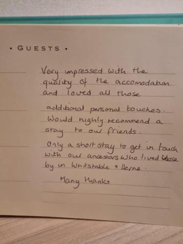 a piece of paper with writing on it at CASALIE at Seasalter Whitstable in Seasalter
