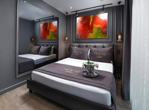 En eller flere senge i et værelse på Ataşehir The Place Suites