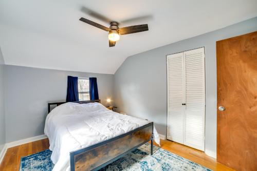 a bedroom with a bed and a ceiling fan at Penn Hills Home about 11 Mi to Pittsburgh 