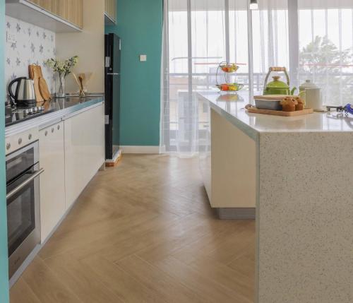 Η κουζίνα ή μικρή κουζίνα στο Laurel Hill-Suites