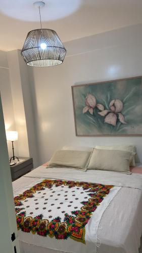 A bed or beds in a room at Loft Obelisco