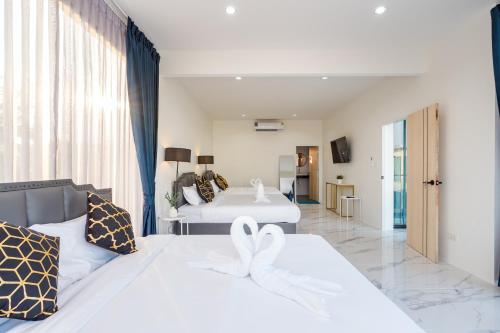 Ruang duduk di U TOO!! Poolvilla Huahin