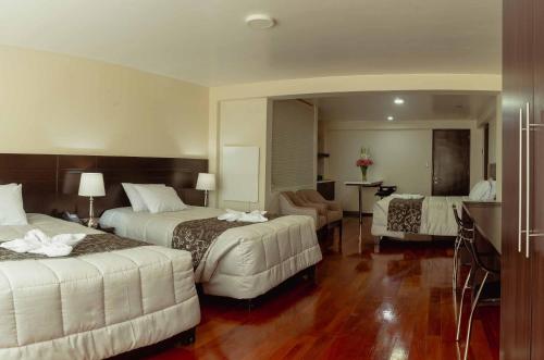 Group House Apart Hotelにあるベッド