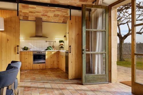 Dapur atau dapur kecil di Turismo Rural Mas Ametller