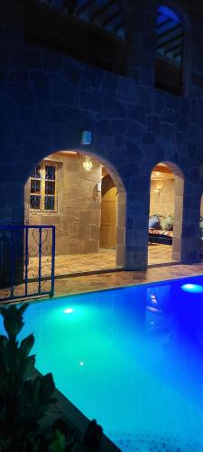 The swimming pool at or close to DAR EL HACHIMI EL IDRISSI