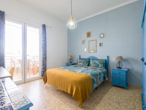 Кровать или кровати в номере Casita Canaria Playa Beachfront Access & Lateral Ocean View With Terrace