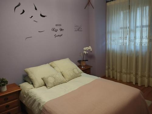 A bed or beds in a room at Felices Sueños