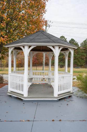 a white gazebo with a black roof at Quality Inn & Suites Lexington South in Lexington