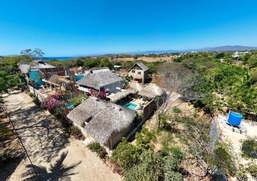 an aerial view of a house with a resort at Casa Terra in Paso Hondo