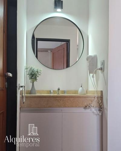 a bathroom with a sink and a mirror at m boero 3231 in Rosario