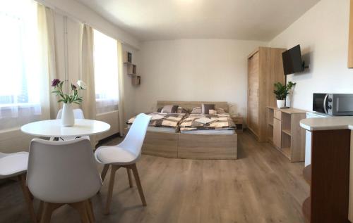 Postel nebo postele na pokoji v ubytování Apartmán PodFaustinkou
