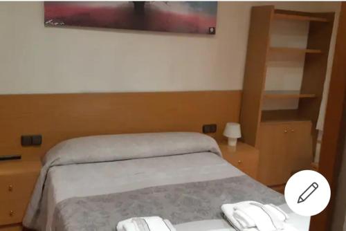 Llit o llits en una habitació de Centro de sabadell apartamento espacioso