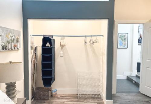 a door leading into a room with a shower at The Creek Retreat - Totally private 1Br/1Bd 