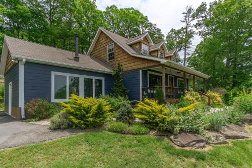 a home with a blue house at Mountain Over Main Street 5 Min. to Downtown Weaverville, Fire Pit & Views! in Weaverville