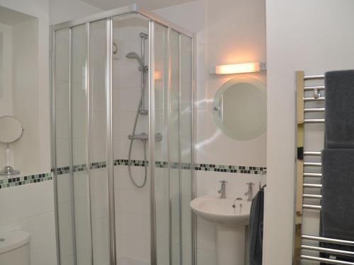 a bathroom with a shower and a sink at 1 bed in Bradford-on-Avon 58771 in Erlestoke