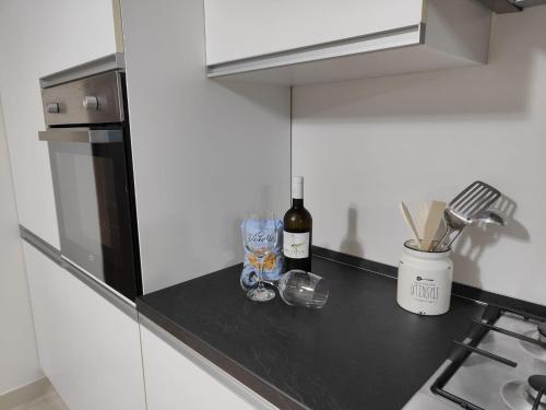 Una cocina o cocineta en Siracusa Suite, AC + Wi-Fi + Free Private Parking