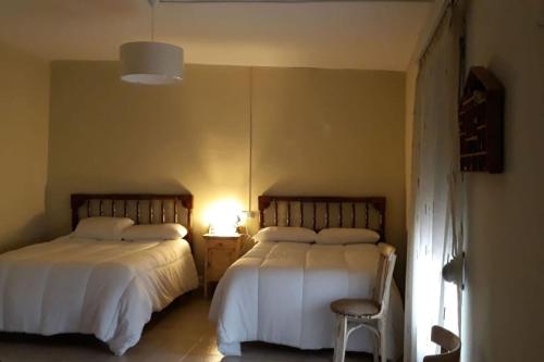 Postel nebo postele na pokoji v ubytování One bedroom chalet with shared pool terrace and wifi at Sieso de Huesca