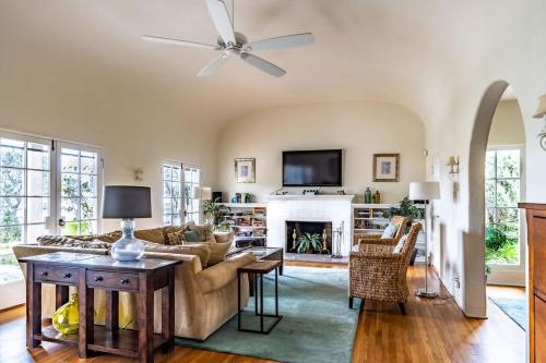 a living room with a couch and a fireplace at La Jolla Shores Oceanview Retreat in San Diego