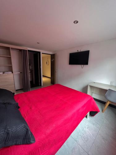 Ένα ή περισσότερα κρεβάτια σε δωμάτιο στο Hotel Urban Cholula