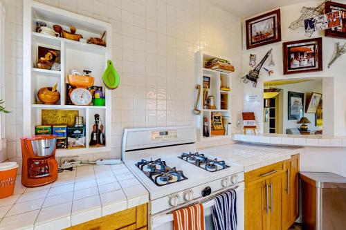 a kitchen with a stove top oven in a kitchen at Desert Beauty in Phoenix