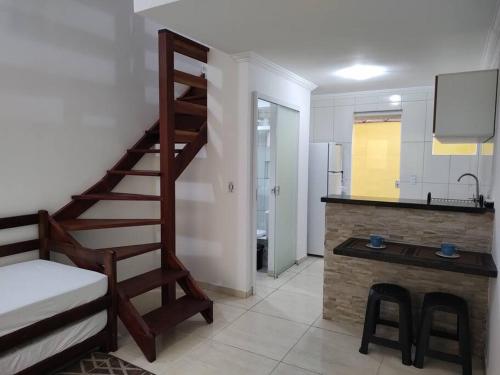 En eller flere senge i et værelse på Lofts Primavera Centro Histórico Paraty