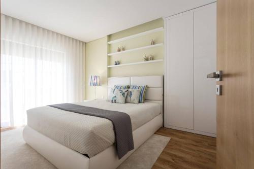 Ένα ή περισσότερα κρεβάτια σε δωμάτιο στο Cosy Chalet in Várzea with Private Pool