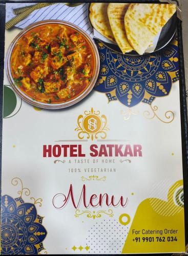 a poster of a curry with a plate of bread at KOKARI,S HOMESTAY 101 BY AL MANAL in Bhatkal