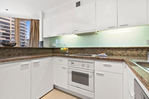 A kitchen or kitchenette at Quay West 2302 Self-Catering