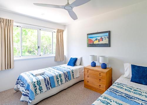 Una cama o camas en una habitación de Secret Getaway