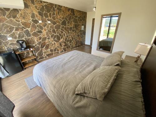 Ένα ή περισσότερα κρεβάτια σε δωμάτιο στο Estancia Cataviña Valle de Guadalupe