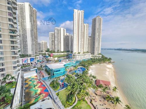 an aerial view of a beach in front of a city at Country Garden Danga Bay InStyle Sea View Homestay Suite by NEO in Johor Bahru