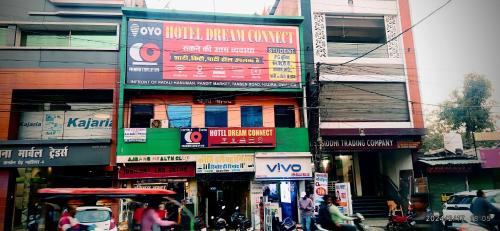 a busy city street with many signs on buildings at OYO Hotel Dream Connect in Gwalior