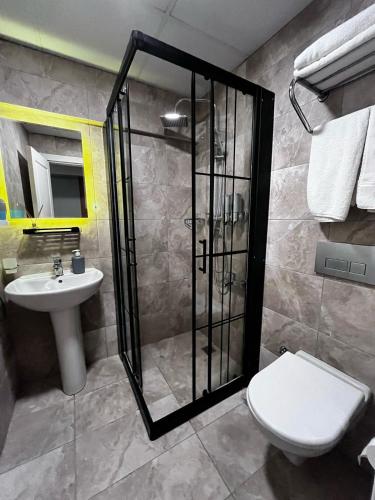 Koupelna v ubytování Naila Hotel
